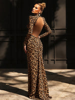 Abito Lungo Leopardato "Wild Glamour" con Cut-out e Spalle Strutturate