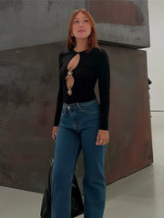 Top "Cut-Out Glam" - Il pezzo forte del tuo guardaroba serale.